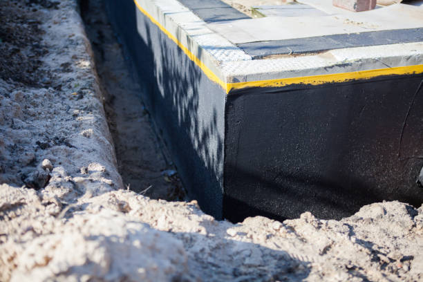 Professional Waterproofing technician working in Sunman, IN